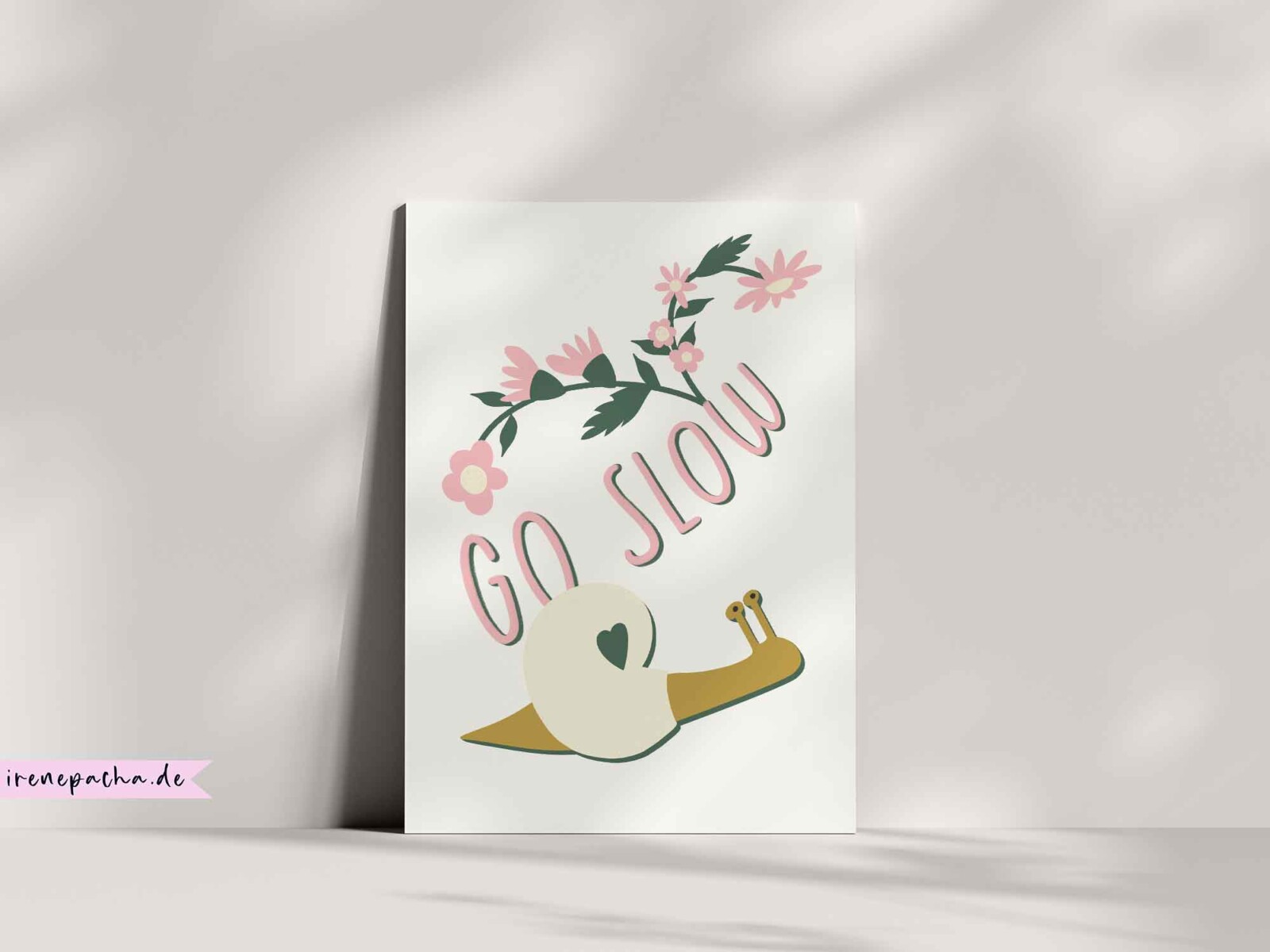 Whimsical snail illustration with a heart shell, pink flowers, and handlettered “Go Slow” text.